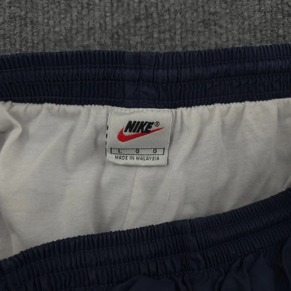VINTAGE Nike Track Pants Mens‎ Large Blue Lined Elastic Cuff Zip Leg Athletic
